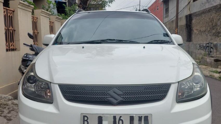 Suzuki SX4 X over At matic 2010 Harga Cash saja Bensin putih istimewa