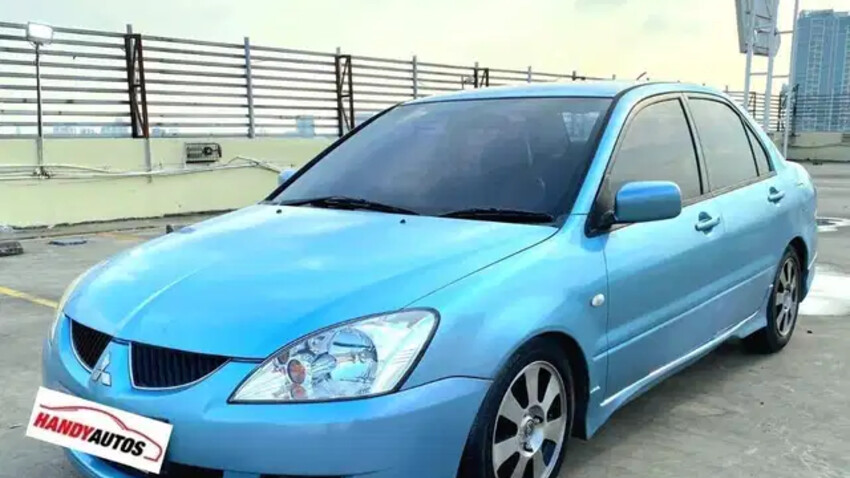 Mitsubishi Lancer 1.8 Tahun 2004 Manual Biru Muda Metalik