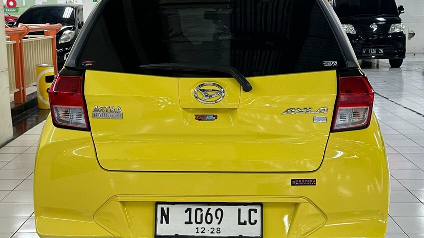 TDP 15 jt Daihatsu New Ayla 1.0 X Manual 2023 Kuning